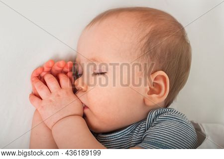 Healthy Restful Sleep For Child Up To One Year Old. Infant And Sleep Problems In Bed. Baby Sucking T