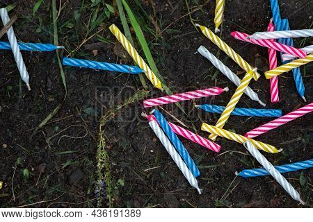 A Macro Close Up Photograph Of A Bunch Of Spiral Wax Birthday Candles Spilled And Scattered On The D
