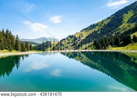 Lake Of Balme And Mountain Landscape In La Clusaz, Haute-savoie, France