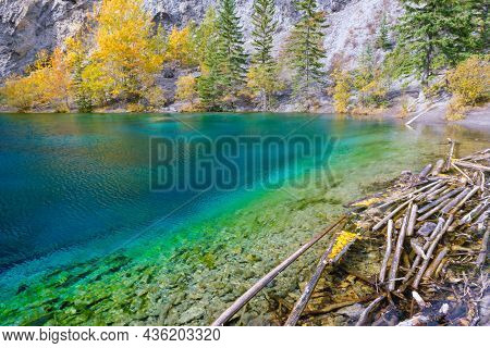 Canmore, Alberta, Canada - 28 September 2021: Grassi Lake In The Southern Canadian Rockies Overlooki
