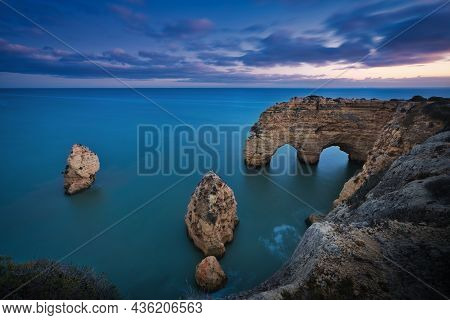 Photo Of The Rocks And Natural Arches On Algrave Portugal