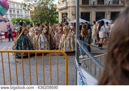 Burriana, Spain 10-10-2021: Portrait Of Falleras Women, Wearing The Traditional Costume Of Fallas