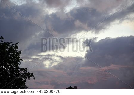 Sky With Thunderclouds. Crimson Sunset. Sky With Thunderclouds.