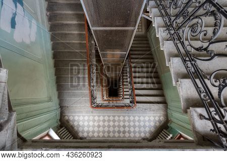 Photo Of Spiral Staircase In Residential House. Typical Building In Historical Center In Saint Peter