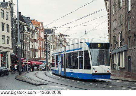 Modern Tram In The City Center. Amsterdam, Netherlands, 10-11-2019.
