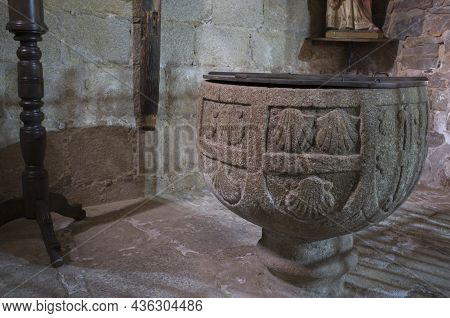 Caceres, Spain - Jan 14th, 2021: Baptismal Font Of Church Of Santiago, Early Site Of The Military Or