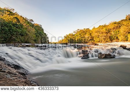 Capela Do Rosario Dam With Cadeia River And Forest