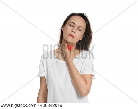 Mature Woman Doing Thyroid Self Examination On White Background