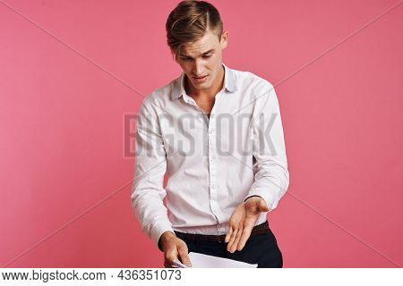 Portrait Of A Man With A Phone In Hand Fashion Posing Isolated Background