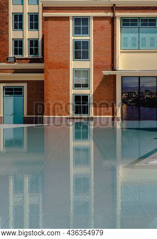 Siriraj Bimuksthan Museum With Reflections In The Water. Vintage-style Building. No Focus, Specifica