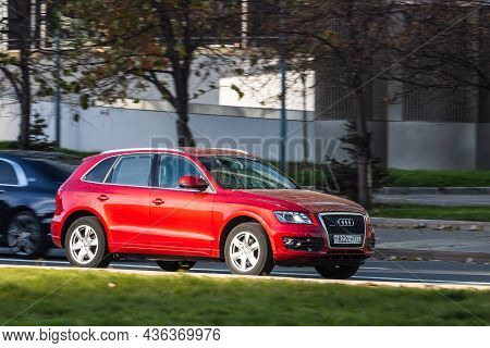 Moscow; Russia - October 14; 2021: Red Audi Q5 Is Driving Fast On The Street On A Warm Autumn Day Ag