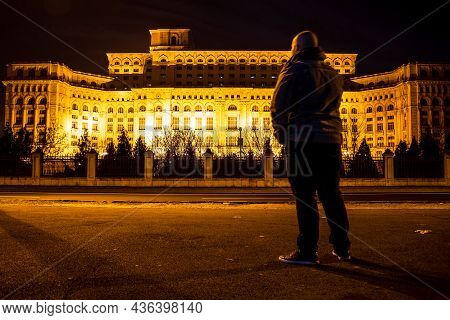 Man In Front Of Palace Of Parliament, Bucharest, Romania
