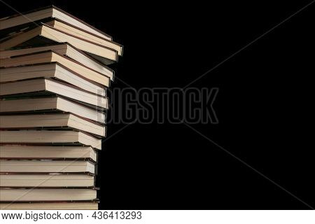 Stack Of Books Isolated On Black Background