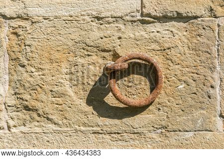 Close-up Of A Rusty Metal Solvent With Shadow On Sunny Day