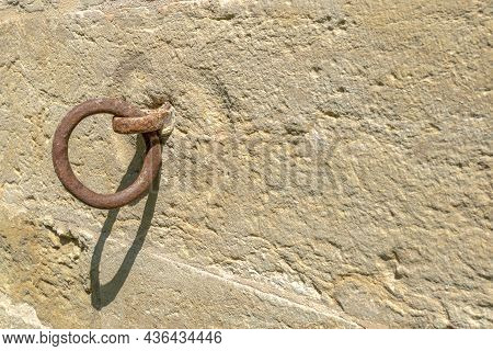 Close-up Of A Rusty Metal Solvent With Shadow On Sunny Day