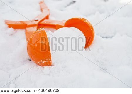 A Tool For Modeling And Making Snowballs From Snow For Children's Winter Games. Kid Winter Games Wit