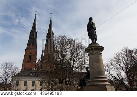 Sweden, Uppsala - April 19 2019: The View Of Sculpture Near University Main Building And Uppsala Cat
