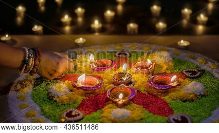 Traditional Diya Lamps Lit During Diwali Celebration