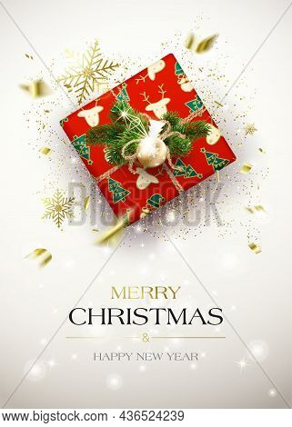 Merry Christmas Greetings. Card With A Gift Box And A Golden Dust