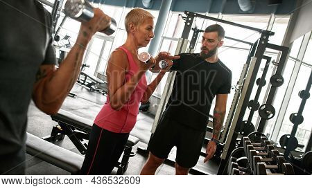 Self-determined Attractive Aged Woman Looking Younger Than Her Age Living Active Life With Regular F