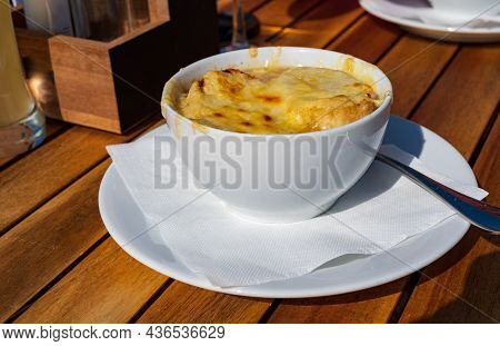 French Caramelized Onion Soup With Croutons And Gruyere Cheesse From Oven