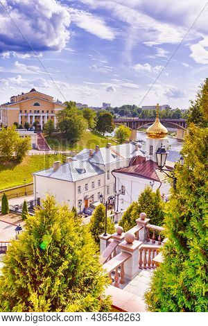 Cityscape Of The City Of Vitebsk With Golden Cathedral Dome And Bridge Across The Dvina River At Day
