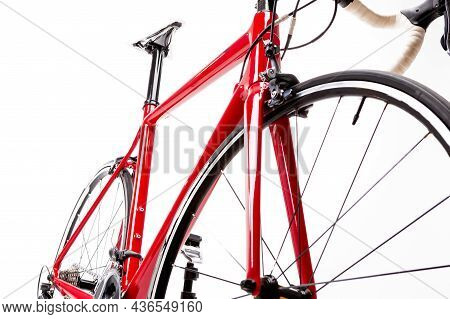 Lower View Of Professional Carbon Road Bike With Aero Wheelset Over White. Horizontal Shot