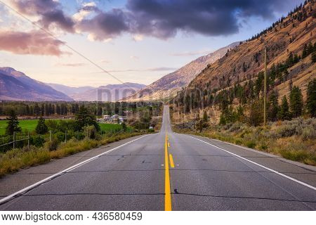 Scenic Road, Hwy 3, In The Valley Around The Canadian Mountain Landscape. Colorful Sunset Sky Art Re