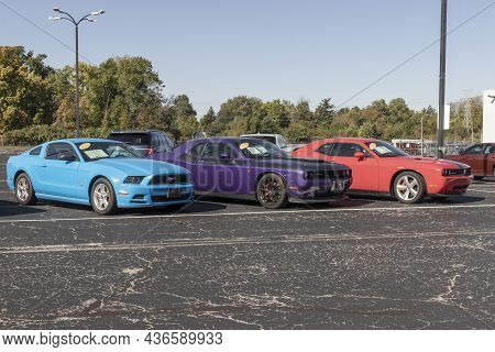 Indianapolis - Circa October 2021: Used Ford Mustang And Two Used Dodge Challengers. With Supply Iss