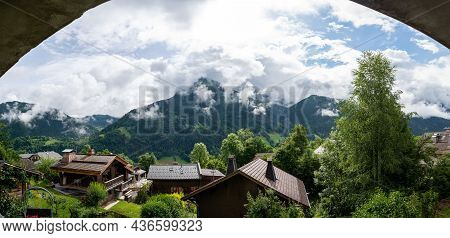 Panoramic View On Mountain Villages, Green Forests And Apline Meadows Near Saint-gervais-les-bains,
