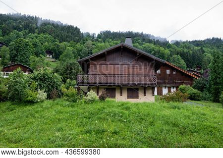 Panoramic View On Mountain Villages, Green Forests And Apline Meadows Near Saint-gervais-les-bains,