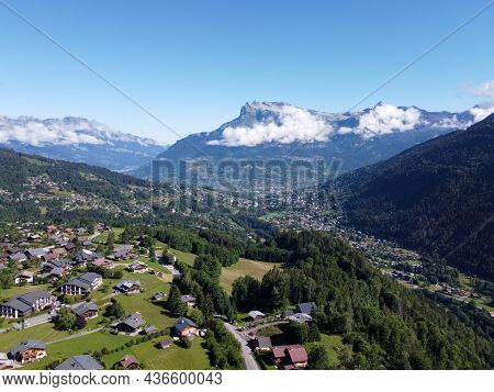 Panoramic View On Mountain Villages, Green Forests And Apline Meadows Near Saint-gervais-les-bains,