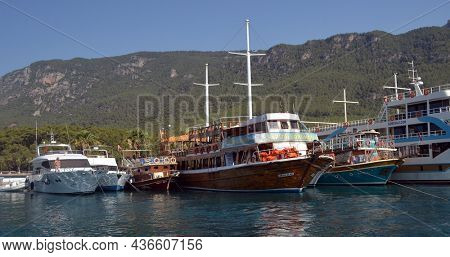 Boats and yachts at the in the marina of village Akyaka - slow city in Turkey.August 1,2021. Mugla,Turkey