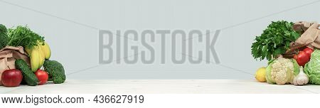 Fresh Green Vegetables On A Wooden Background