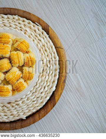 Traditional Pineapple Jam Tart Roll Cookies Or A Malay Called Tart Nanas In A Plastic Container.