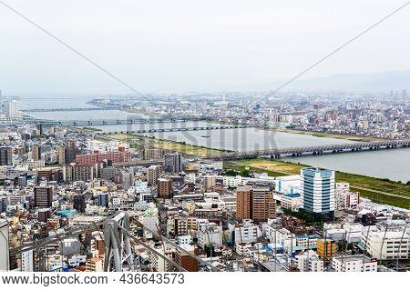 Osaka, Japan - 18 May, 2015: View From Above On Osaka City With Skyline With Skycrapers, Highways An