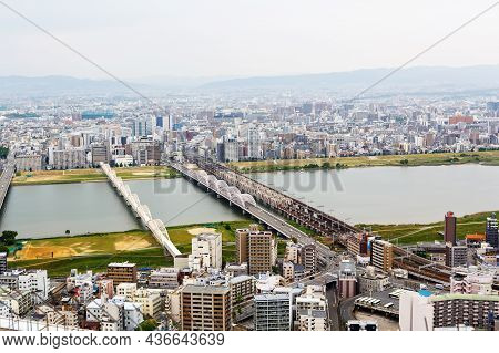 Osaka, Japan - 18 May, 2015: View From Above On Osaka City With Skyline With Skycrapers, Highways An