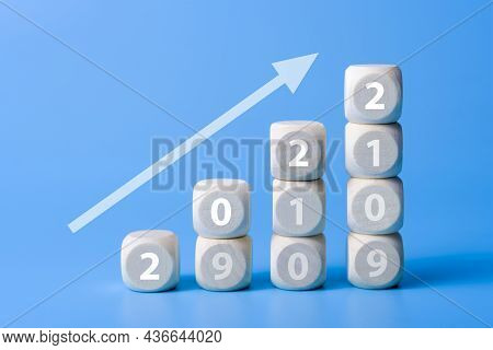 2022 New Year Concept. Wooden Blocks With Text 2022 On Table. Copy Space. The Concept Of The New 202