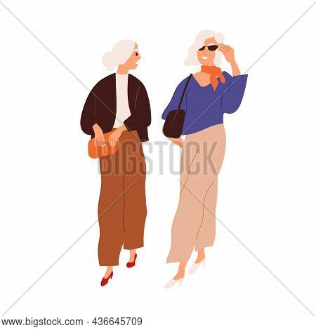 Modern Senior Women Friends Walking And Talking Together. Fashion Elegant Elderly Gray-haired Ladies