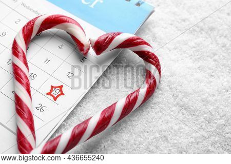 Saint Nicholas Day. Heart Shape Frame Of Candy Canes And Calendar With Marked Date December 19 On Sn