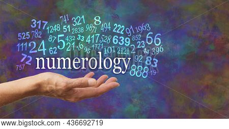 Numerology Is In The Palm Of Your Hand  - Female Open Palm With The Word Numerology Floating Above S