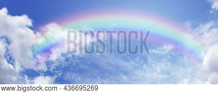 Beautiful Sunny Summer Blue Sky Panoramic Rainbow - Fluffy Clouds With A Giant Arcing Rainbow Agains