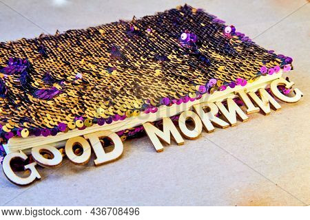 The Inscription From Wooden Letters - Good Morning, Lies On The Edge Of A Notebook In A Taphole With