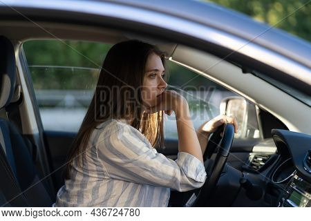 Drunk Girl Driving Car. Unhappy Young Female Sit On Driver Seat Suffering From Headache Or Handover.