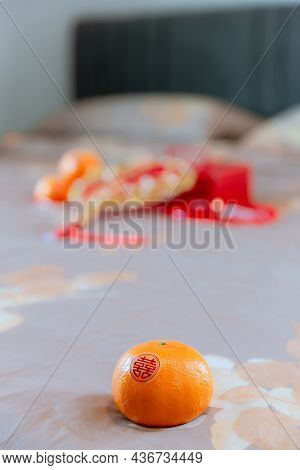 Chinese Wedding Ceremony. Orange Chinese Text Are Attached. The Chinese Text In The Photo Is Pronoun