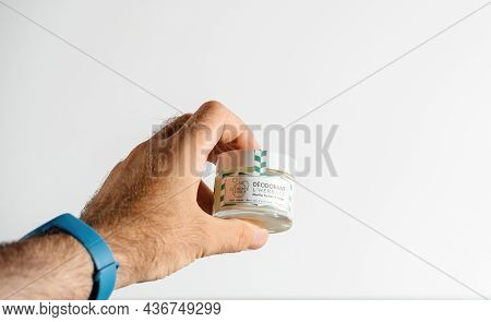Paris, France - Jul 30, 2017: Pov Male Hand Holding Isolated On White Deodorant Manufactured By Clem