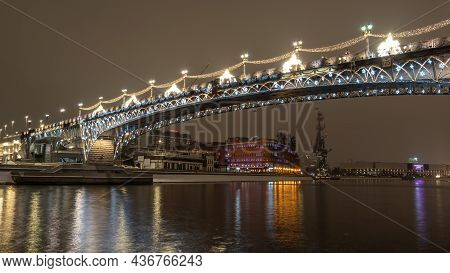 Night View Of The Patriarshy Bridge In Moscow. Patriarshy Bridge Is A Pedestrian Bridge Across The M