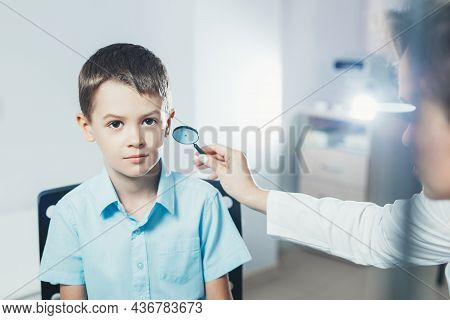 Ophthalmologist Checks The Boy's Vision. Hyperopia. Vision Tests In Children.