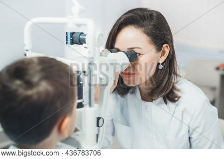 Ophthalmologist Checks The Boy's Vision. Hyperopia. Vision Tests In Children.