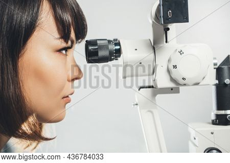 Doctor Scientist Looking Through A Microscope. Scientific Experiment, Hypothesis.